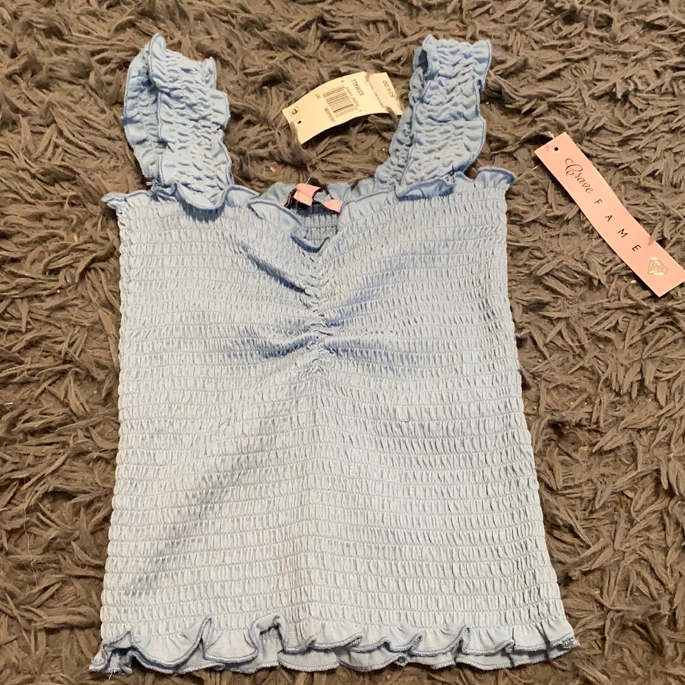 Crave game blue top